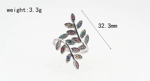 Detailed macro view of retro leaf ring featuring rainbow rhinestones and 32.3mm length