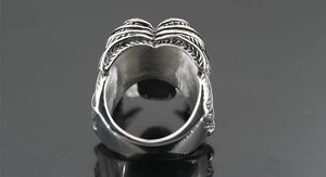 Detail view of gothic skull ring showing brushed interior finish and rib texture