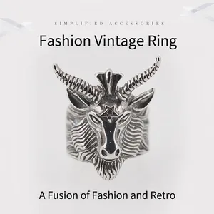 Retro gothic ram head ring in oxidized stainless steel with pentagram star detail