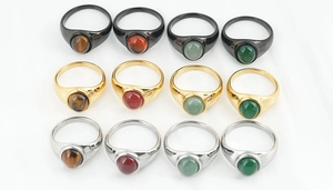 Detailed display of 12 signet rings with tiger eye and agate stones in gold silver and black