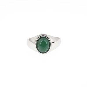 Minimalist silver titanium ring featuring an oval green tiger eye stone on a white background