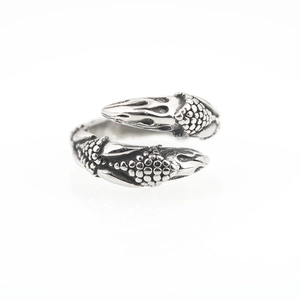 Bague vintage pour hommes avec griffes de dragon, texture écailles et finition acier oxydé