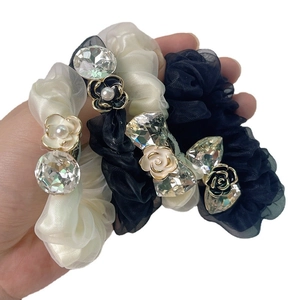Satin scrunchies set with camellia floral pearls and sparkling rhinestones hair ties