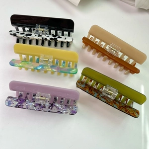 Five-piece set of large acetate hair claw clips in various marbled and retro oil painting colors