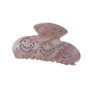 Pink marble acetate hair claw clip with crystal rhinestone smiley face patterns