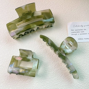 Elegant forest green marble acetate hair claw clips for women set in various shapes