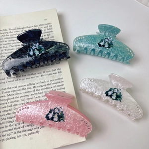 Set of 4 cute cat hair claws in blue, mint, white, and pink with rhinestone accents
