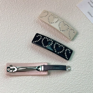 Lot de pinces à cheveux luxe avec strass en noir, beige et rose pour des coiffures élégantes