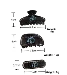 Detailed size chart showing marble acrylic cat hair clips with rhinestone accents