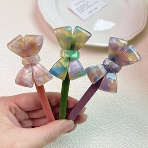 Three gradient acetate bow hair clips in pink orange and blue purple styles