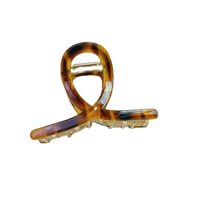 Molletta per capelli in acetato con stampa leopardata rosa e verde e design a croce