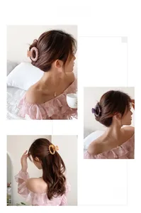 Detailed texture of acetate hair claw clips in amber and marble patterns for women