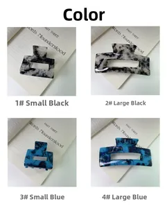 Detailed grid view of blue and black marble acetate hair claws in small and large sizes