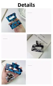 Detail view of blue marble and monochrome square acetate hair claws in two sizes
