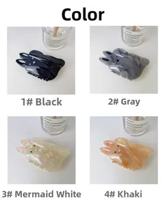 Vue détaillée du lot de 4 pinces à cheveux lapin mignonnes en couleurs variées pour femmes