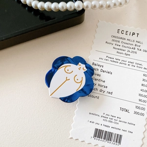 Artistic blue acetate hair clip featuring a gold feminine line art design