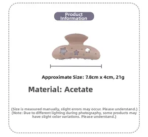 Détail de la pince à cheveux étoile en acétate rose avec dimensions de 7,8cm x 4cm
