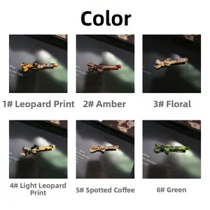 Detailed grid view of acetate bow hair clips in leopard, amber, and emerald patterns