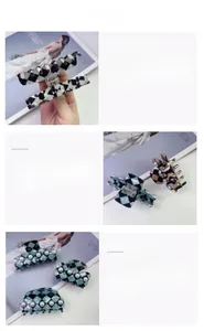 Close-up of retro checkerboard hair claw clips with bow designs and pearl accents