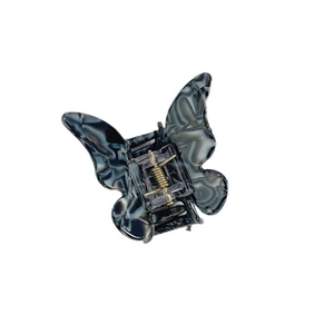 Elegant butterfly hair claw clip with black marble texture and durable metal spring