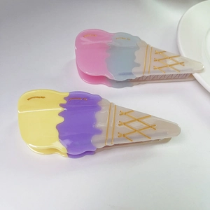 Deux pinces à cheveux en forme de glace en acétate pastel pour coiffures d'été