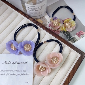 Elegant double camellia hair ties with crystals on high-elasticity black bands