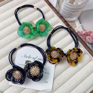 Elegant double-layered camellia flower hair ties with rhinestones in three premium colors