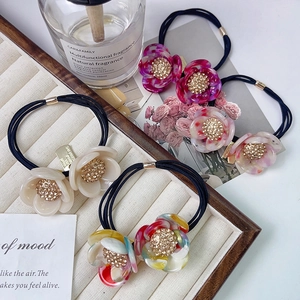 Elegant double-layered flower hair ties with rhinestones and marble acetate texture