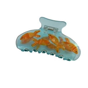Quirky blue acrylic goldfish hair claw clip with crystal eyes and clear water effect