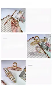 Detail view of large marble resin hair claw clip with golden alloy cross frame