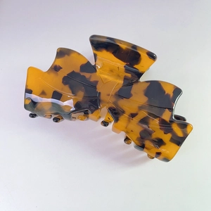 Elegant tortoiseshell acetate bow hair claw clip for women's bun hairstyle styling