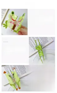 Detailed views of a cute green frog hair claw clip made of acetate with orange accents