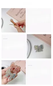 Close-up of bow hair clips featuring inlaid pearls, rhinestones and LOVE text detail