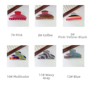 Showcase of six glitter and marble patterned large hair claws in various vibrant colors