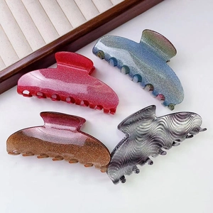 High-quality set of large shimmering acetate claw clips in pink wave and glitter finishes