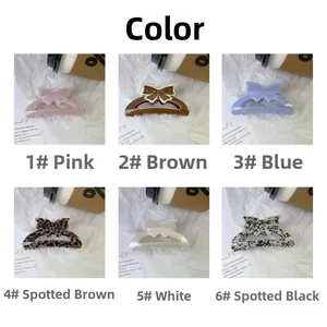 Vue détaillée de six pinces à cheveux noeud élégantes en divers coloris et motifs