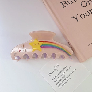 Pince à cheveux étoile en acétate rose avec arc-en-ciel et strass colorés pour femme