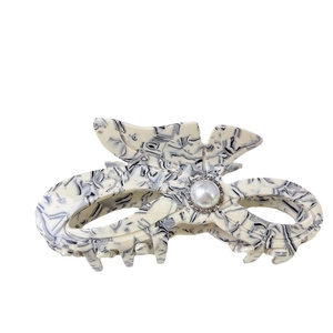 Elegant marble white acetate butterfly hair claw clip with a large centered pearl and crystals