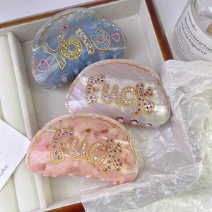 Luxury acetate hair claw clips with colorful rhinestones in marble texture pattern