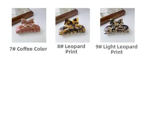 Detailed close-up of bow-shaped hair claws in brown glitter and leopard patterns