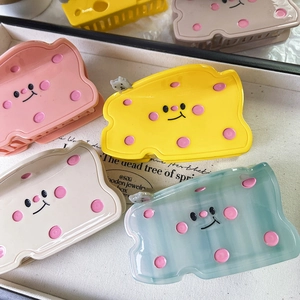 Cute cheese-shaped hair claws with cartoon faces and polka dots in four soft colors
