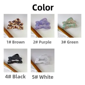 Star-shaped acetic acid hair claws in coffee, purple, green, black and white colors
