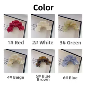 Sélection de six pinces à cheveux noeud en acétate aux motifs marbrés variés