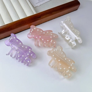 Cute bear hair claws in purple and pink acetate with pearl accents for women