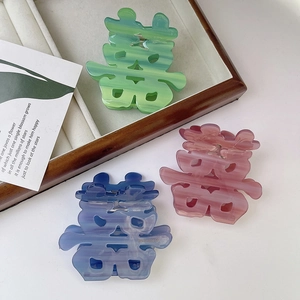 Creative Chinese Xi character acetate hair claws in green, pink and blue marble textures