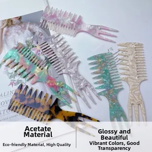 Detail view of acetate hair combs with marble patterns and wide teeth for styling