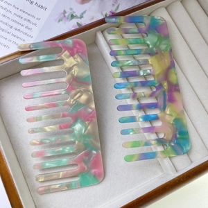 Colorful acetate wide tooth hair combs with marble texture in a soft gift box