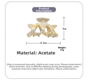 Detail view of acetate hair claw clip showing size dimensions 8.5cm by 5cm in beige marble