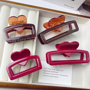 Set of four minimalist heart pattern square hair claws in brown and deep pink colors