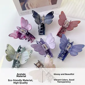 Détails des pinces à cheveux papillon colorées avec cristaux et texture acétate